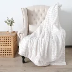 Plaid canapé blanc