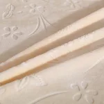 housse de canapé en velours gaufré blanc cassé