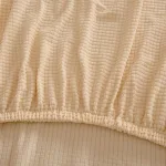 housse de protection canapé beige