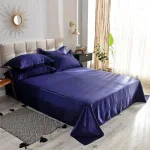 ensemble de literie bleu foncé satin
