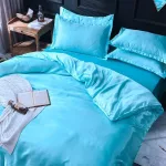 linge de lit bleu turquoise type satin