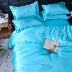 housse de couette et taies bleues turquoise