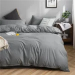 drap housse en coton gris clair