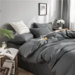 taies d'oreiller gris assorties