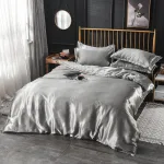 literie gris type satin deux taies d'oreiller