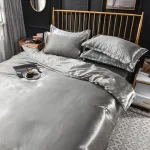 ensemble housse de couette et taies d'oreiller gris