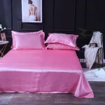 taies d'oreiller rose bonbon satin