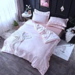taies d'oreiller rose clair en satin