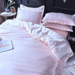 ensemble de taies d'oreiller rose clair satin