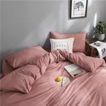 draps rose pêche pour lit
