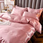 taies d'oreiller assorties rose pêche