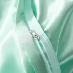 taies d'oreiller assorties vert opaline satin